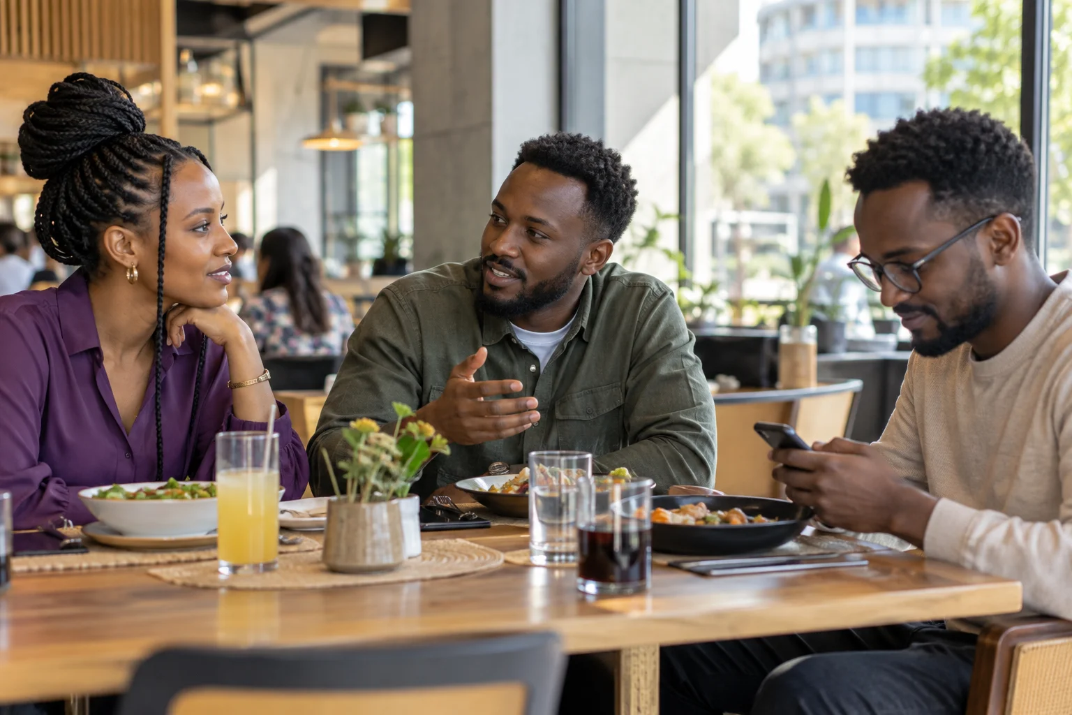 Friends sharing a meal in a café